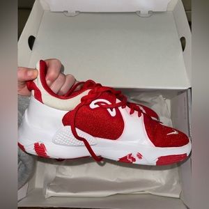 Nike Basketball or Volleyball shoes. MENS size 7.5 WOMENS 9. Red and white.
